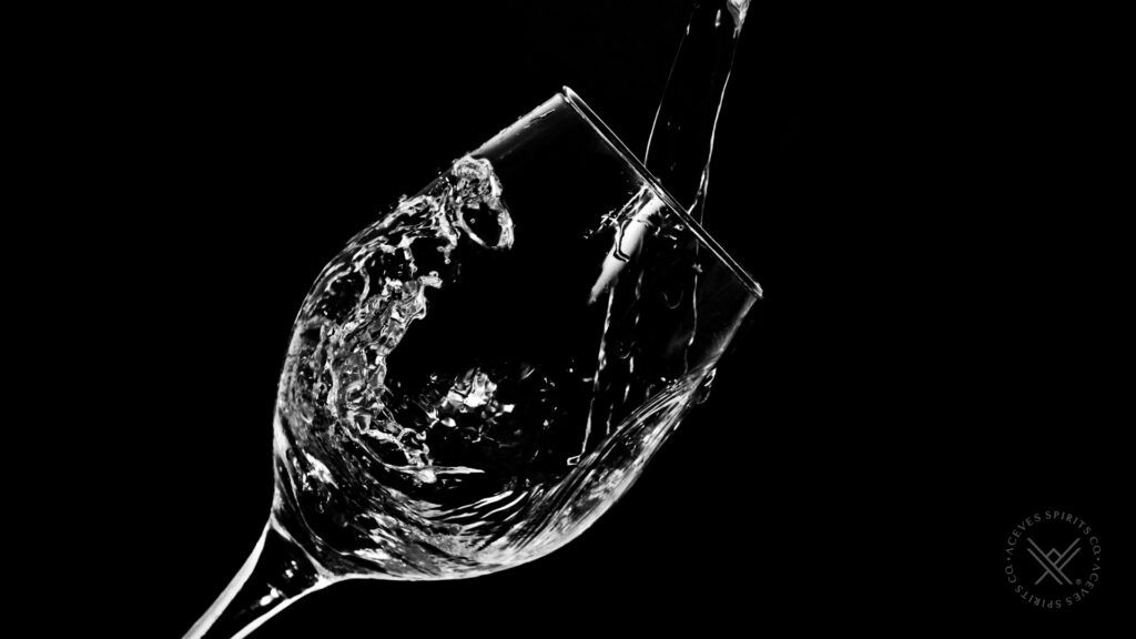 Water splash representing the purity of additive-free tequila certification and liquid architecture